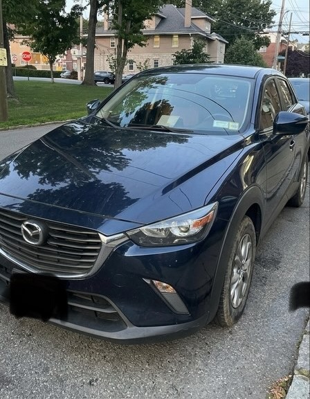 Mazda CX-3 with dull, scratched paint before exterior detail